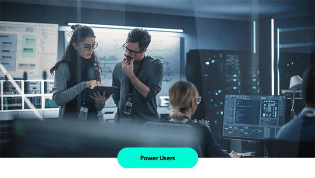 Two people looking at tablet.